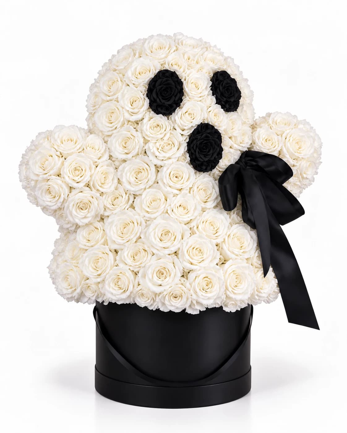 The Boo Box, a ghost sculpted from white roses in a black hat box, from Divina Arrangements' October collection